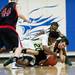 Huron High School senior Demetrius Sims dives for a loose bal in the game against Pickney on Monday, March 4. Daniel Brenner I AnnArbor.com